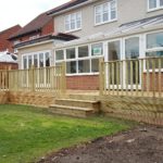 Decked Patio Area with Rails and Steps